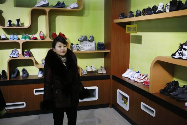 K pop and fancy sneakers Kim Jong Un s cultural revolution AP News